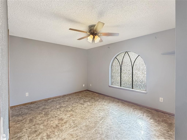 10300 Ryecroft Rd, Oklahoma City, OK 73162 - spare room with ceiling fan and a textured ceiling