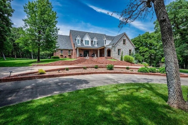 10035 Stone Gate Way, Arcadia, OK 73007 - view of front of home with brick siding and a front yard