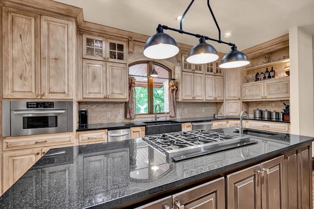 10035 Stone Gate Way, Arcadia, OK 73007 - kitchen with appliances with stainless steel finishes, backsplash, open shelves, and dark stone counters