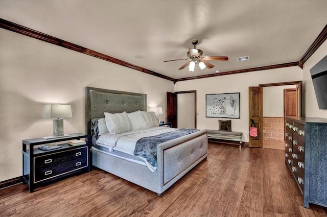 10035 Stone Gate Way, Arcadia, OK 73007 - bedroom featuring crown molding, wood finished floors, and a ceiling fan