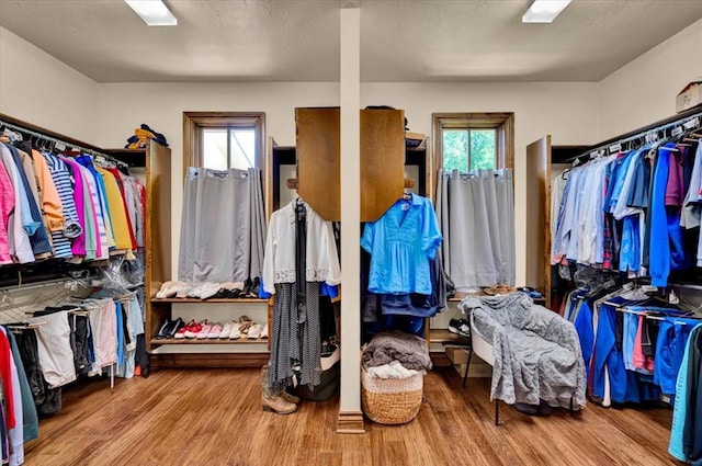 10035 Stone Gate Way, Arcadia, OK 73007 - spacious closet featuring wood finished floors