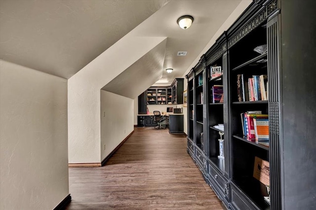10035 Stone Gate Way, Arcadia, OK 73007 - hall featuring a textured wall, dark wood-style floors, and a desk