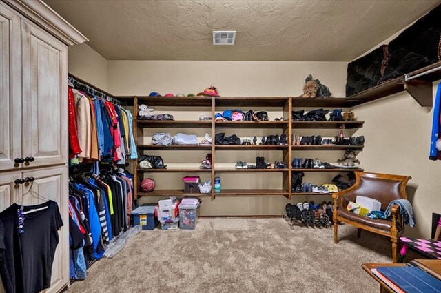 10035 Stone Gate Way, Arcadia, OK 73007 - spacious closet featuring carpet