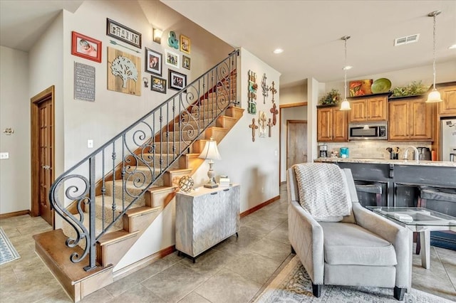 412 Swingman Rd, Yukon, OK 73099 - living room with stairway, recessed lighting, and light tile patterned floors