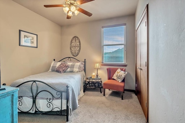 412 Swingman Rd, Yukon, OK 73099 - bedroom featuring carpet flooring, a closet, and ceiling fan