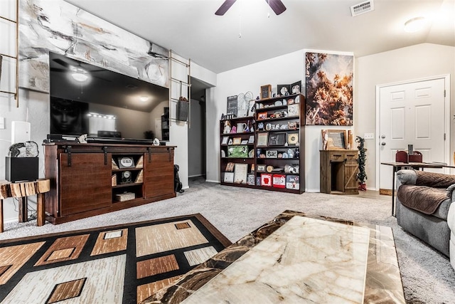 9920 Black Bear Trl, Yukon, OK 73099 - living area featuring carpet flooring, ceiling fan, and lofted ceiling