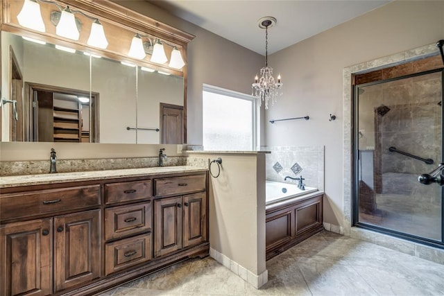 2216 SW 117th St, Oklahoma City, OK 73170 - bathroom with a shower stall, a garden tub, double vanity, and a chandelier