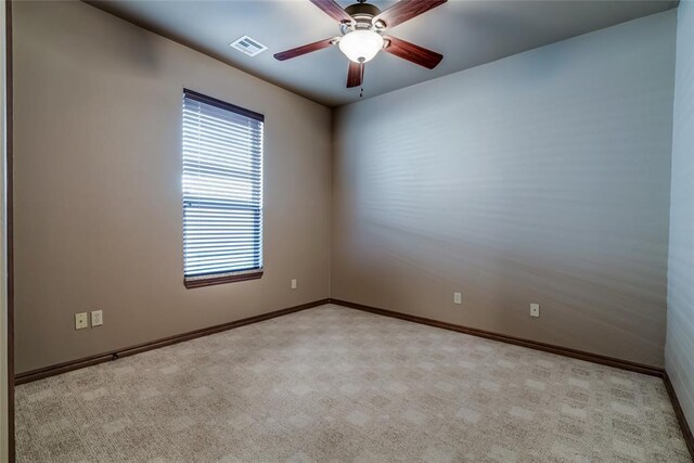 2216 SW 117th St, Oklahoma City, OK 73170 - spare room with carpet flooring and a ceiling fan