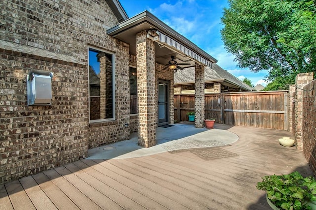 2216 SW 117th St, Oklahoma City, OK 73170 - wooden terrace featuring a ceiling fan