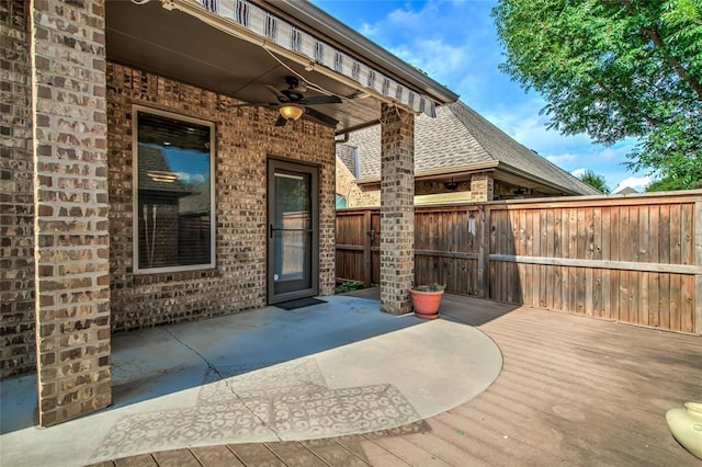 2216 SW 117th St, Oklahoma City, OK 73170 - fenced backyard with ceiling fan, a wooden deck, and a patio area