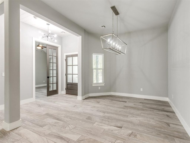 8520 NW 123rd St, Oklahoma City, OK 73142 - unfurnished dining area featuring a chandelier and baseboards