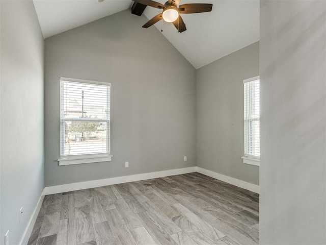 8520 NW 123rd St, Oklahoma City, OK 73142 - spare room with a ceiling fan and vaulted ceiling