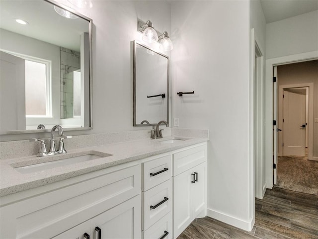 8520 NW 123rd St, Oklahoma City, OK 73142 - full bath with double vanity and wood finished floors