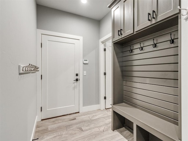 8520 NW 123rd St, Oklahoma City, OK 73142 - mudroom with light wood-type flooring and recessed lighting