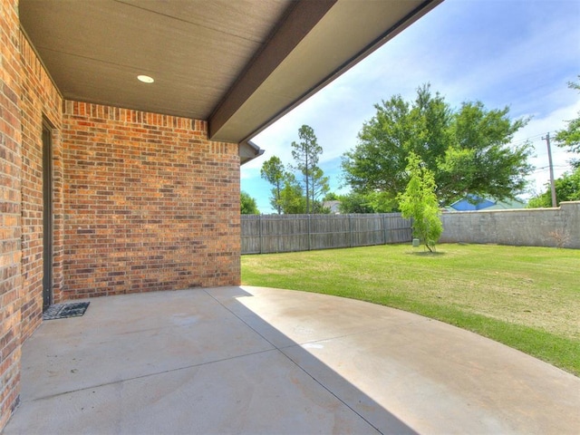 8520 NW 123rd St, Oklahoma City, OK 73142 - fenced backyard featuring a patio area