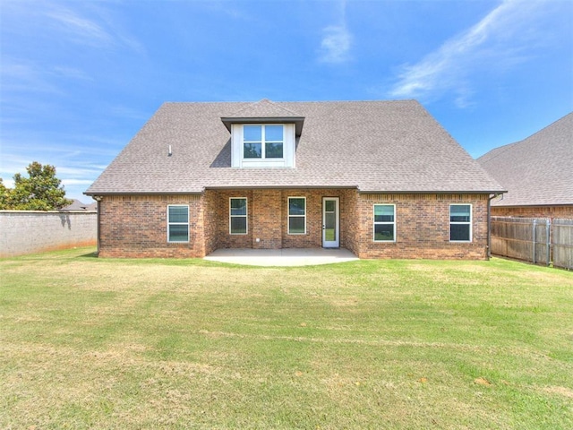 8520 NW 123rd St, Oklahoma City, OK 73142 - rear view of property with brick siding, a patio, a fenced backyard, and a shingled roof