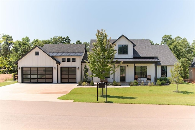 416 Old Creek Rd, Edmond, OK 73034 - modern farmhouse style home featuring covered porch, board and batten siding, and a standing seam roof