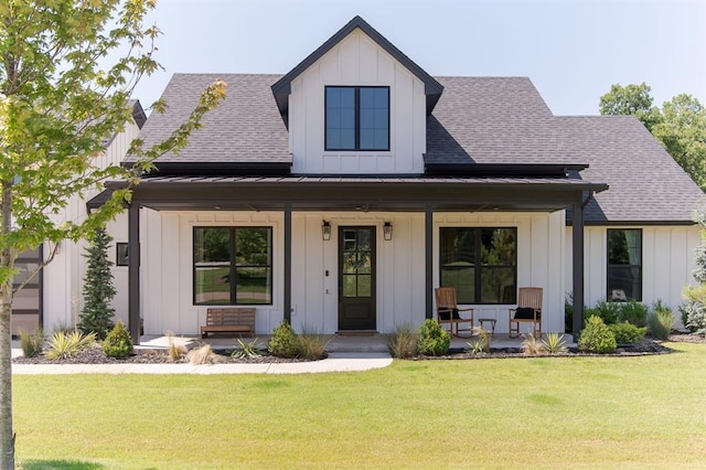 416 Old Creek Rd, Edmond, OK 73034 - modern inspired farmhouse with a porch, board and batten siding, roof with shingles, and a standing seam roof