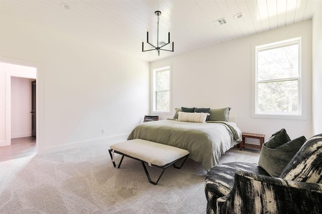 416 Old Creek Rd, Edmond, OK 73034 - bedroom with a chandelier, carpet, and wooden ceiling