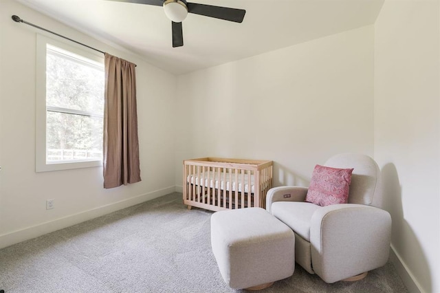 416 Old Creek Rd, Edmond, OK 73034 - bedroom with carpet, a ceiling fan, and a crib