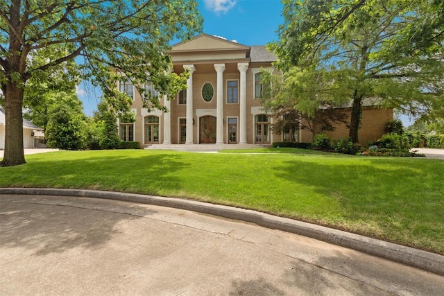 4800 Bocage Pl, Oklahoma City, OK 73142 - view of front of home with a front lawn and stucco siding