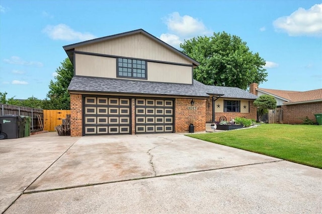 1017 Linn Ln, Yukon, OK 73099 - view of front of house featuring brick siding, an attached garage, and concrete driveway