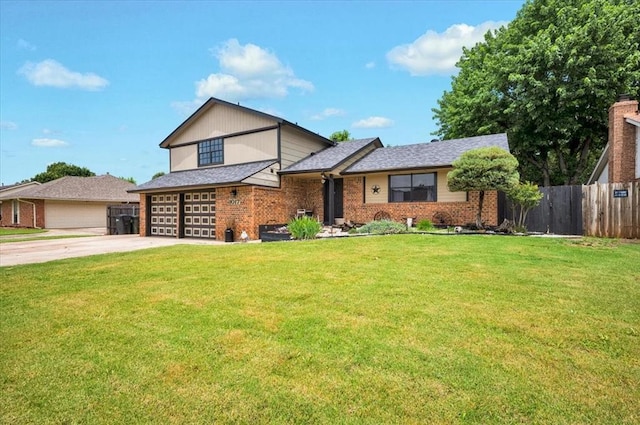 1017 Linn Ln, Yukon, OK 73099 - split level home featuring driveway, brick siding, and a garage