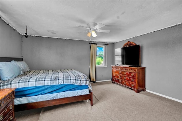 1017 Linn Ln, Yukon, OK 73099 - carpeted bedroom featuring baseboards and ceiling fan