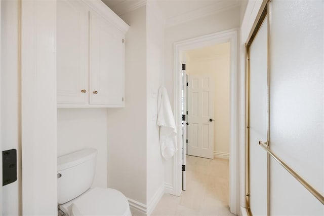 305 Carmel Valley Way, Edmond, OK 73025 - bathroom featuring toilet and ornamental molding