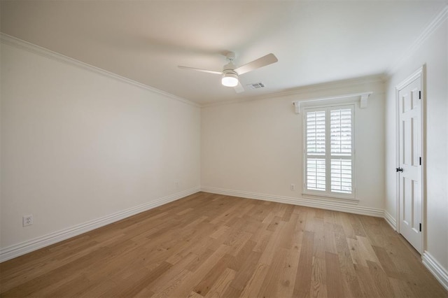305 Carmel Valley Way, Edmond, OK 73025 - unfurnished room featuring light wood-style flooring, ceiling fan, and crown molding