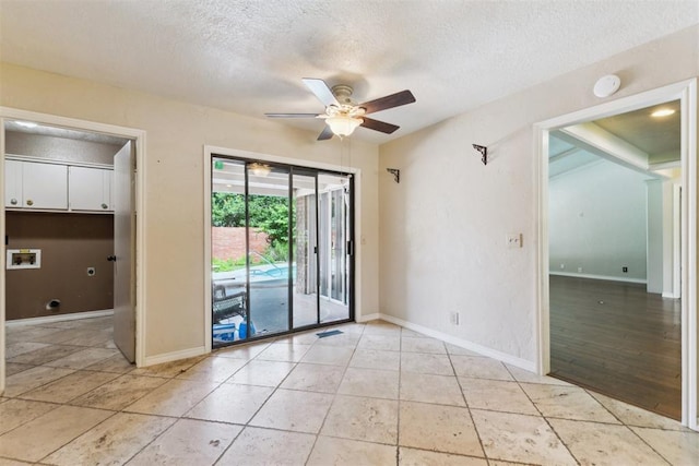 4424 Brighton Ct, Norman, OK 73072 - unfurnished room with a ceiling fan and a textured ceiling