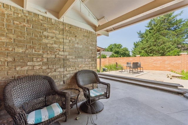 4424 Brighton Ct, Norman, OK 73072 - fenced backyard featuring a patio area and outdoor dining area