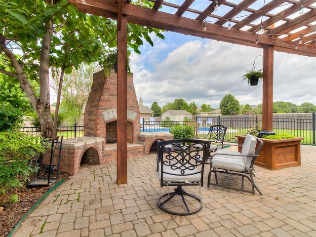 7821 Lindsay Ln, Edmond, OK 73025 - view of patio / terrace with an outdoor brick fireplace and a pergola