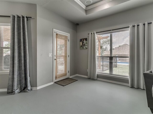 7821 Lindsay Ln, Edmond, OK 73025 - doorway to outside featuring ornamental molding and plenty of natural light
