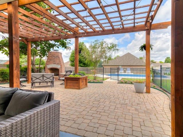 7821 Lindsay Ln, Edmond, OK 73025 - view of patio / terrace with an outdoor brick fireplace and a pergola