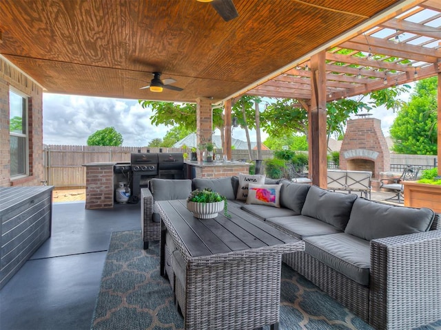 7821 Lindsay Ln, Edmond, OK 73025 - view of patio featuring an outdoor living space with a fireplace, area for grilling, a ceiling fan, and a pergola