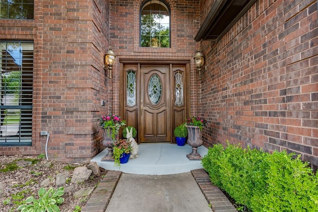 10116 Thompson Ave, Yukon, OK 73099 - doorway to property with brick siding