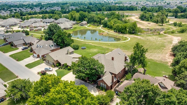 10116 Thompson Ave, Yukon, OK 73099 - aerial perspective of suburban area with a large body of water