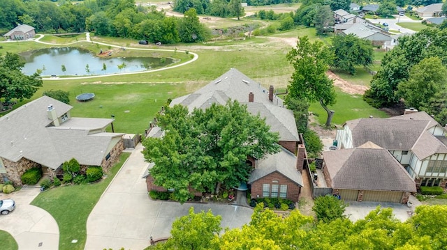 10116 Thompson Ave, Yukon, OK 73099 - aerial perspective of suburban area with a nearby body of water