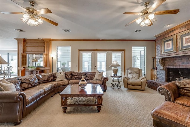 10116 Thompson Ave, Yukon, OK 73099 - living area featuring ceiling fan, light colored carpet, ornamental molding, and plenty of natural light