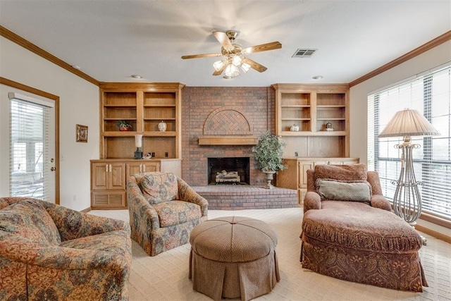 10116 Thompson Ave, Yukon, OK 73099 - living room with a ceiling fan, healthy amount of natural light, a brick fireplace, ornamental molding, and built in features