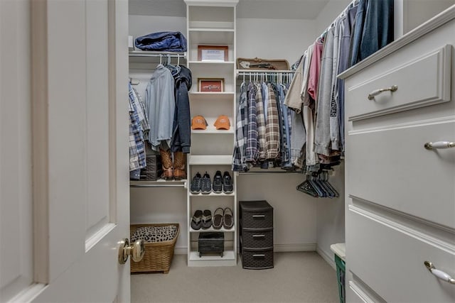 10116 Thompson Ave, Yukon, OK 73099 - spacious closet featuring carpet floors
