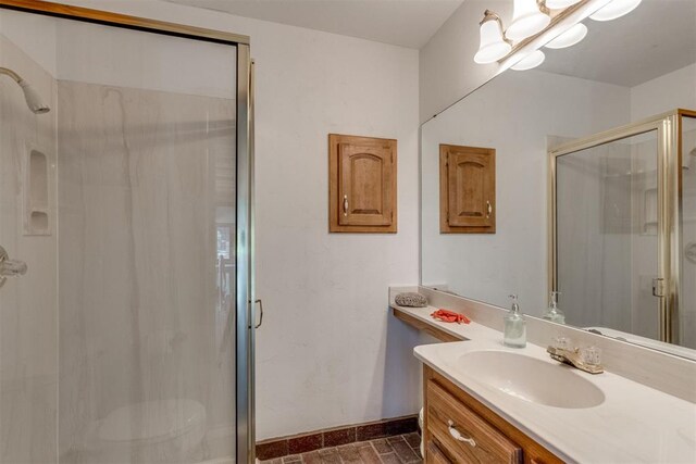 10116 Thompson Ave, Yukon, OK 73099 - bathroom featuring a stall shower and vanity