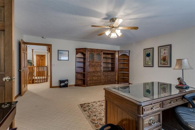 10116 Thompson Ave, Yukon, OK 73099 - home office with a ceiling fan and carpet floors