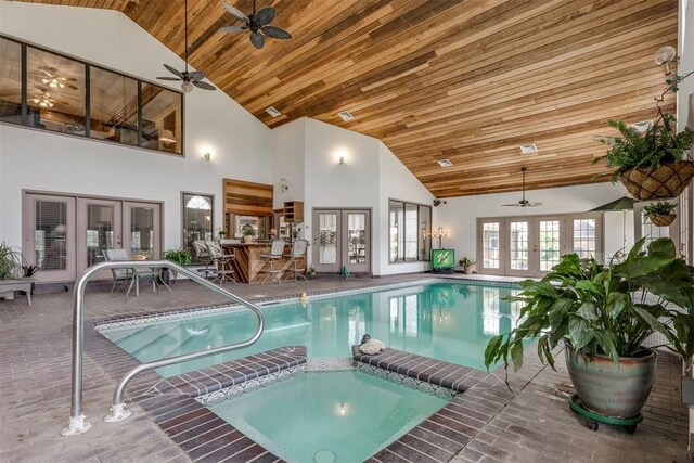 10116 Thompson Ave, Yukon, OK 73099 - view of swimming pool with a ceiling fan, french doors, and a pool with connected hot tub