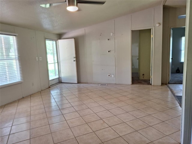 18451 Rolling Oak Rd, Newalla, OK 74857 - unfurnished room with a ceiling fan and light tile patterned floors