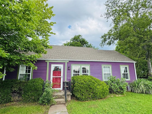 502 N Park Ave, Norman, OK 73069 - view of front of home with roof with shingles and a front lawn