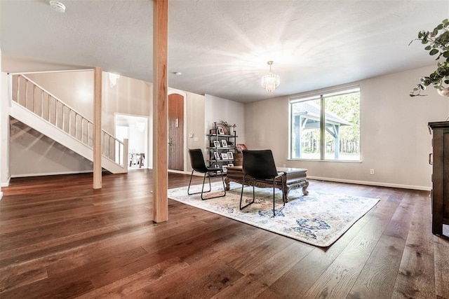 6540 S Donna Ln, Oklahoma City, OK 73150 - living area featuring stairway, wood finished floors, and a chandelier