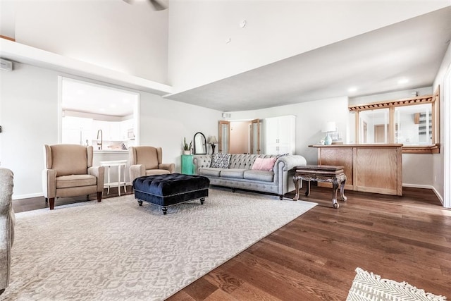 6540 S Donna Ln, Oklahoma City, OK 73150 - living area with dark wood-type flooring and a towering ceiling