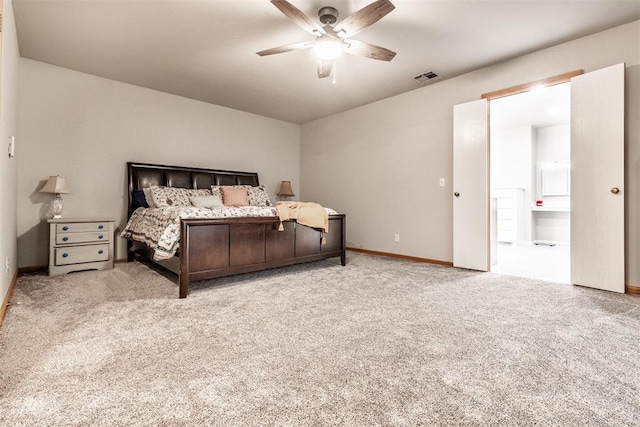 6540 S Donna Ln, Oklahoma City, OK 73150 - bedroom with carpet floors, ensuite bathroom, and a ceiling fan